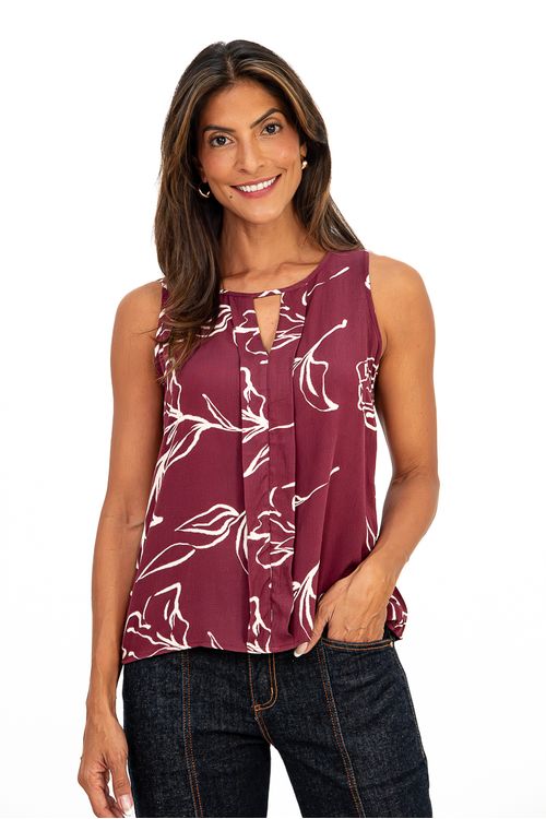 BLUSA-E-FEITA-DE-TECIDO-PLANO-EM-VISCOSE-COM-ESTAMPA-IRIS.-TEM-DECOTE-EM-U-COM-GOTA-DETETALHE-PREGA-LARGA-SOLTA-E-SEM-MANGA