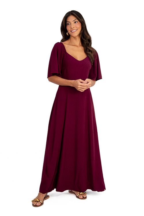 VESTIDO-MIDI-FEITO-EM-DE-VISCOSE-MAQUINETADA.-TEM-DECOTE-EM-V-COM-RECORTES-MEIA-MANGA-COM-ELASTICO-FRANZIDA-GODE-E-FECHAMENTO-EM-ZIPER-NAS-COSTAS.
