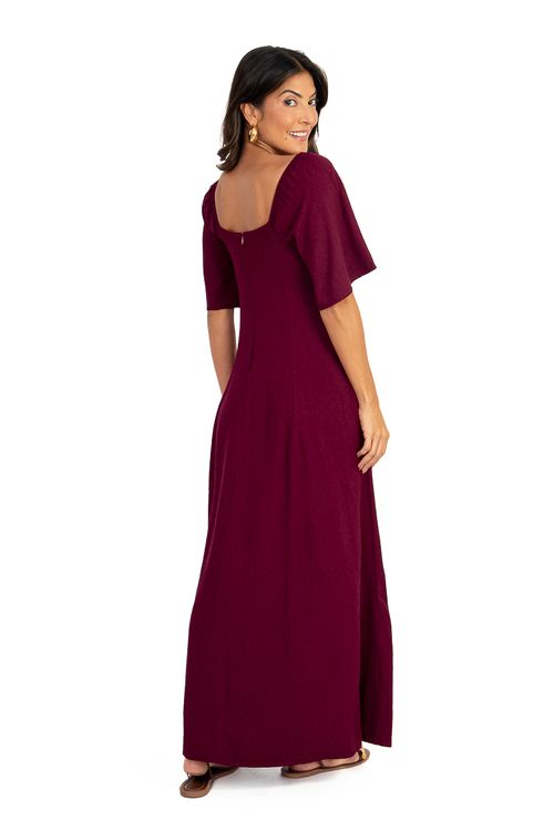 VESTIDO-MIDI-FEITO-EM-DE-VISCOSE-MAQUINETADA.-TEM-DECOTE-EM-V-COM-RECORTES-MEIA-MANGA-COM-ELASTICO-FRANZIDA-GODE-E-FECHAMENTO-EM-ZIPER-NAS-COSTAS.