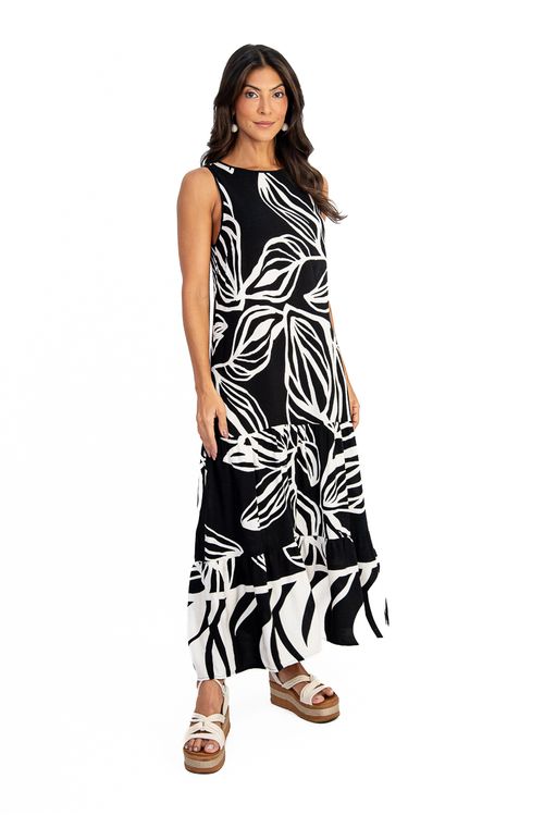 VESTIDO-MIDI-FEITO-DE-TECIDO-PLANO-EM-VISCOSE-BARRADA-COM-ESTAMPA-FOLHAS.-TEM-DECOTE-CANOA-SEM-MANGA-CONTA-COM-UM-DETALHE-DE-GOTA-COM-BOTAO-NAS-COSTAS-E-SAIA-DUAS-MARIAS.